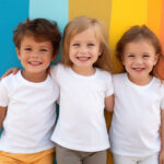 Little children wearing white t-shirts stand together