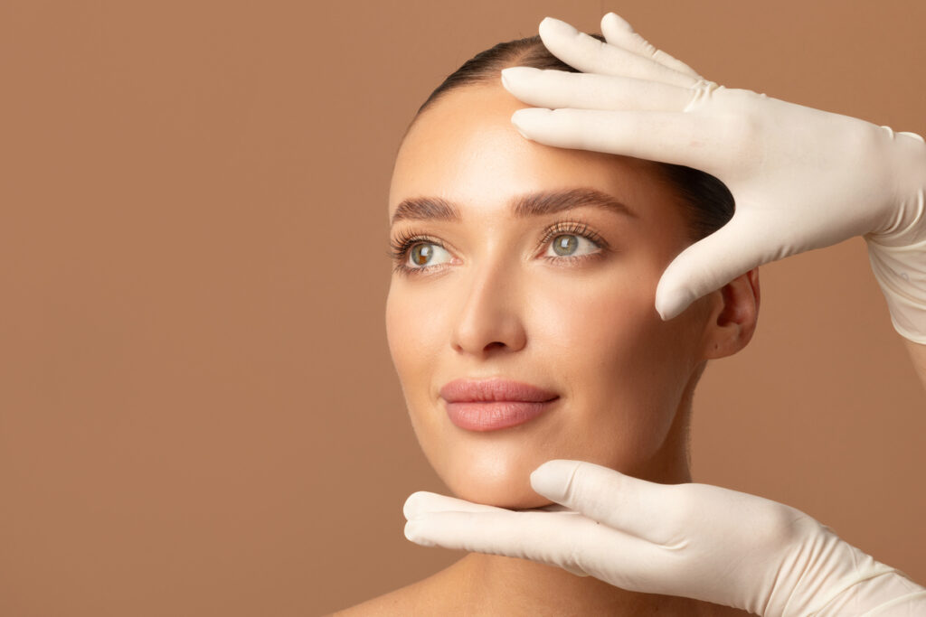 Woman having her face evaluated for plastic surgery in Pittsburgh, PA